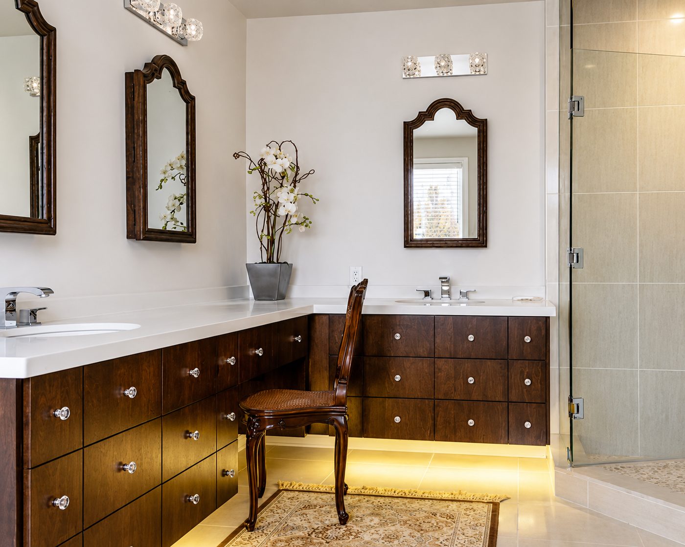Classic double-vanity bathroom renovation with walk-in glass shower in Toronto