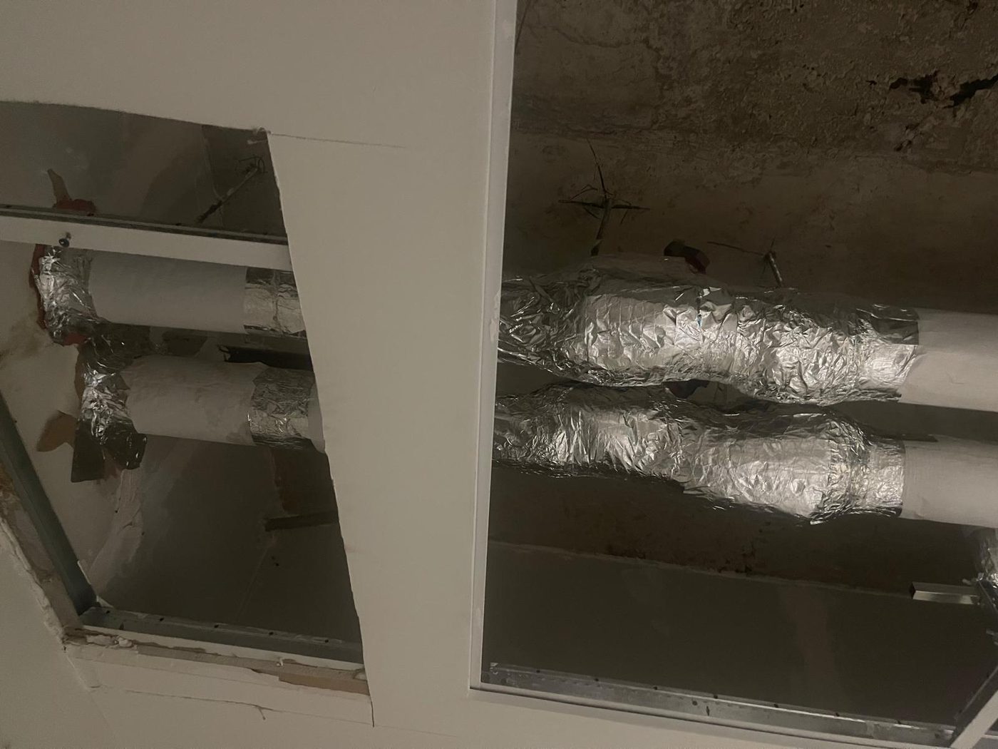 Banded pipe insulation on a mechanical piping system in Toronto