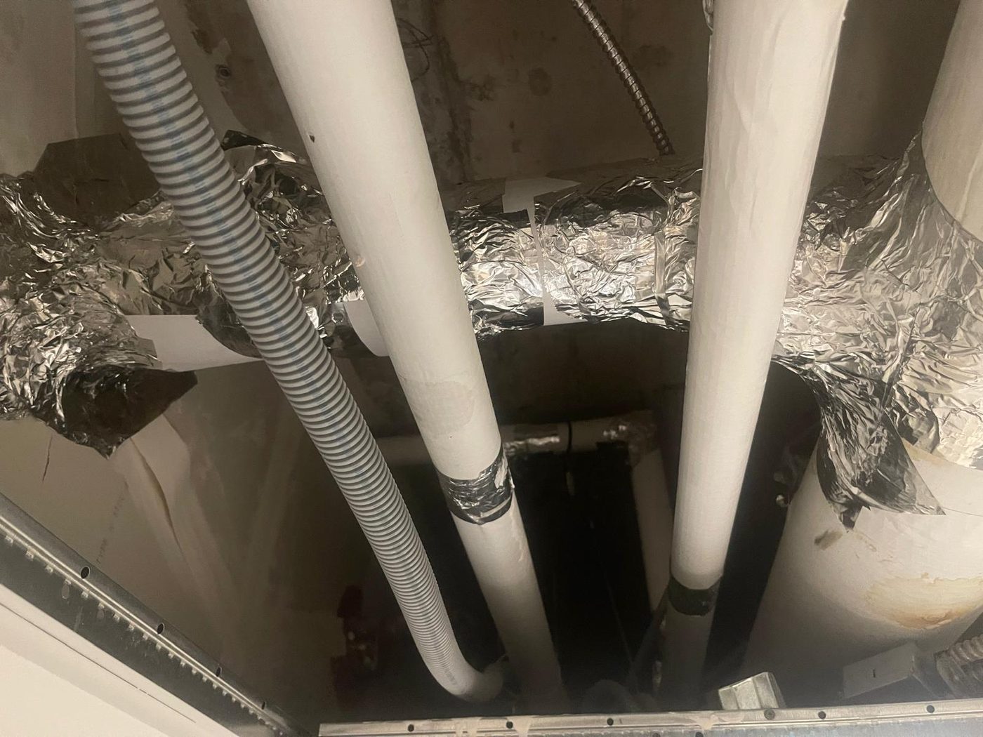 HVAC duct insulation wrapped in foil-faced fibreglass, Toronto